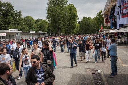 MILAN, ITALY - JUNE 3: Thousands of fans gather outside the stadium waiting for the gates to open at Bruce Springsteen world tour in Milan JUNE 3, 2013のeditorial素材
