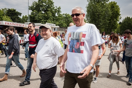 MILAN, ITALY - JUNE 3: Thousands of fans gather outside the stadium waiting for the gates to open at Bruce Springsteen world tour in Milan JUNE 3, 2013のeditorial素材