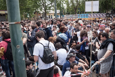 MILAN, ITALY - JUNE 3: Thousands of fans gather outside the stadium waiting for the gates to open at Bruce Springsteen world tour in Milan JUNE 3, 2013のeditorial素材