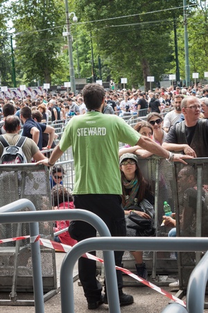 MILAN, ITALY - JUNE 3: Thousands of fans gather outside the stadium waiting for the gates to open at Bruce Springsteen world tour in Milan JUNE 3, 2013のeditorial素材