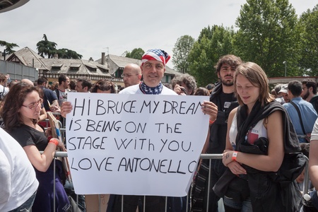 MILAN, ITALY - JUNE 3: Thousands of fans gather outside the stadium waiting for the gates to open at Bruce Springsteen world tour in Milan JUNE 3, 2013のeditorial素材