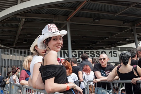 MILAN, ITALY - JUNE 3: Thousands of fans gather outside the stadium waiting for the gates to open at Bruce Springsteen world tour in Milan JUNE 3, 2013のeditorial素材