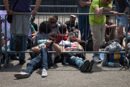 MILAN, ITALY - JUNE 3: Thousands of fans gather outside the stadium waiting for the gates to open at Bruce Springsteen world tour in Milan JUNE 3, 2013のeditorial素材