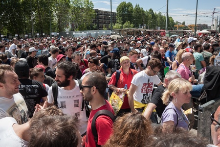MILAN, ITALY - JUNE 3: Thousands of fans gather outside the stadium waiting for the gates to open at Bruce Springsteen world tour in Milan JUNE 3, 2013のeditorial素材