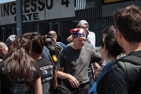 MILAN, ITALY - JUNE 3: Thousands of fans gather outside the stadium waiting for the gates to open at Bruce Springsteen world tour in Milan JUNE 3, 2013のeditorial素材