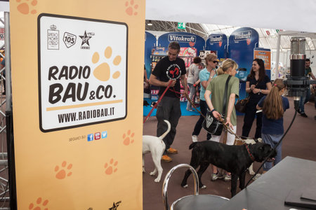 MILAN, ITALY - JUNE 8: People and dogs visit Quattrozampe in fiera exhibition, important event dedicated to dogs and their owners in Milan on JUNE 8, 2013.のeditorial素材