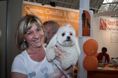 MILAN, ITALY - JUNE 8: People and dogs visit Quattrozampe in fiera exhibition, important event dedicated to dogs and their owners in Milan on JUNE 8, 2013.のeditorial素材