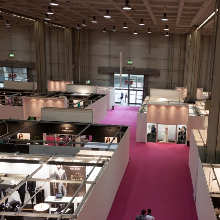 MILAN, ITALY - JUNE 21: People visit SposaItalia exhibition, international presentation of bridal and formal wear according to Italian style in Milan on JUNE 21, 2013.のeditorial素材