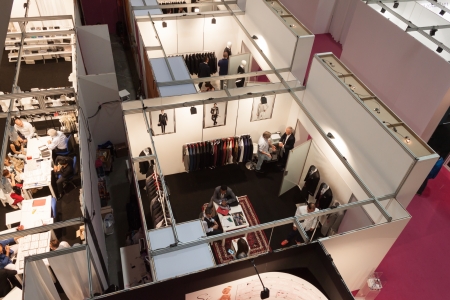 MILAN, ITALY - JUNE 21: People visit SposaItalia exhibition, international presentation of bridal and formal wear according to Italian style in Milan on JUNE 21, 2013.のeditorial素材
