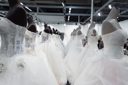 MILAN, ITALY - JUNE 21: People visit SposaItalia exhibition, international presentation of bridal and formal wear according to Italian style in Milan on JUNE 21, 2013.のeditorial素材
