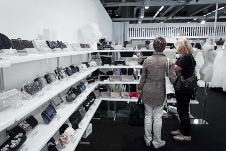 MILAN, ITALY - JUNE 21: People visit SposaItalia exhibition, international presentation of bridal and formal wear according to Italian style in Milan on JUNE 21, 2013.のeditorial素材