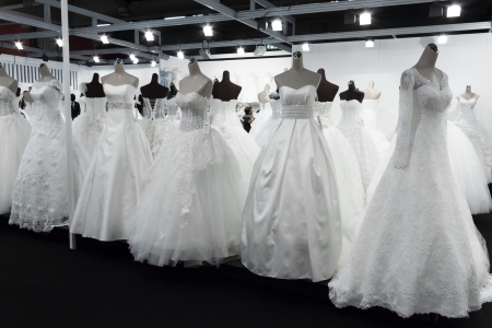 MILAN, ITALY - JUNE 21: People visit SposaItalia exhibition, international presentation of bridal and formal wear according to Italian style in Milan on JUNE 21, 2013.のeditorial素材