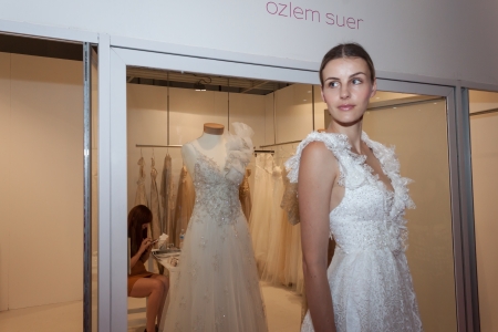 MILAN, ITALY - JUNE 21: People visit SposaItalia exhibition, international presentation of bridal and formal wear according to Italian style in Milan on JUNE 21, 2013.のeditorial素材
