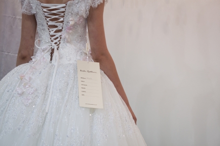 MILAN, ITALY - JUNE 21: People visit SposaItalia exhibition, international presentation of bridal and formal wear according to Italian style in Milan on JUNE 21, 2013.のeditorial素材