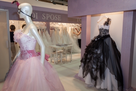 MILAN, ITALY - JUNE 21: People visit SposaItalia exhibition, international presentation of bridal and formal wear according to Italian style in Milan on JUNE 21, 2013.のeditorial素材