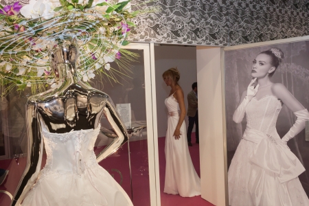 MILAN, ITALY - JUNE 21: People visit SposaItalia exhibition, international presentation of bridal and formal wear according to Italian style in Milan on JUNE 21, 2013.のeditorial素材