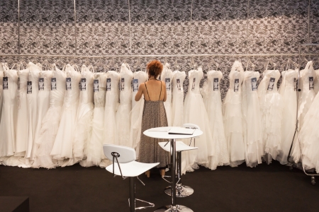 MILAN, ITALY - JUNE 21: People visit SposaItalia exhibition, international presentation of bridal and formal wear according to Italian style in Milan on JUNE 21, 2013.のeditorial素材