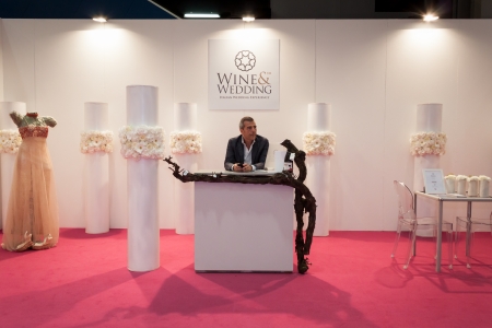 MILAN, ITALY - JUNE 21: People visit SposaItalia exhibition, international presentation of bridal and formal wear according to Italian style in Milan on JUNE 21, 2013.のeditorial素材