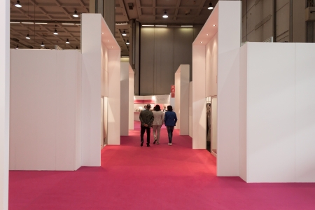 MILAN, ITALY - JUNE 21: People visit SposaItalia exhibition, international presentation of bridal and formal wear according to Italian style in Milan on JUNE 21, 2013.のeditorial素材