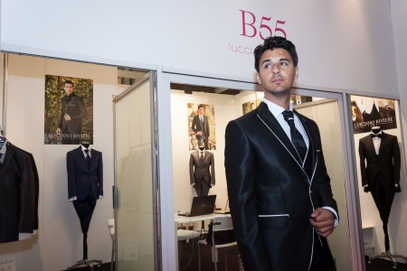 MILAN, ITALY - JUNE 21: People visit SposaItalia exhibition, international presentation of bridal and formal wear according to Italian style in Milan on JUNE 21, 2013.のeditorial素材