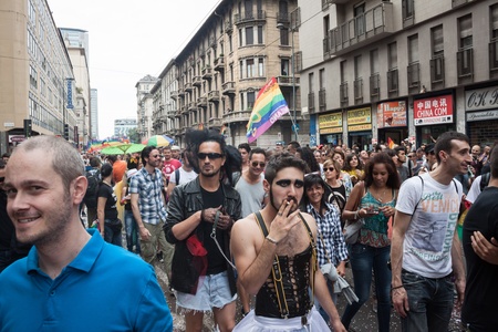 MILAN, ITALY - JUNE 29: Thousands of people march in the city streets for the annual gay pride parade, claiming equality and legal rights in Milan on JUNE 29, 2013のeditorial素材