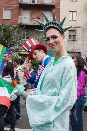 MILAN, ITALY - JUNE 29: Thousands of people march in the city streets for the annual gay pride parade, claiming equality and legal rights in Milan on JUNE 29, 2013のeditorial素材