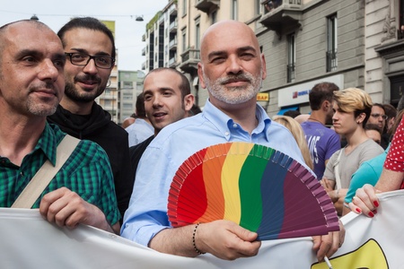 MILAN, ITALY - JUNE 29: Thousands of people march in the city streets for the annual gay pride parade, claiming equality and legal rights in Milan on JUNE 29, 2013のeditorial素材