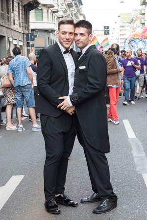 MILAN, ITALY - JUNE 29: Thousands of people march in the city streets for the annual gay pride parade, claiming equality and legal rights in Milan on JUNE 29, 2013のeditorial素材
