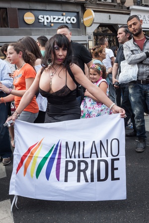 MILAN, ITALY - JUNE 29: Thousands of people march in the city streets for the annual gay pride parade, claiming equality and legal rights in Milan on JUNE 29, 2013のeditorial素材