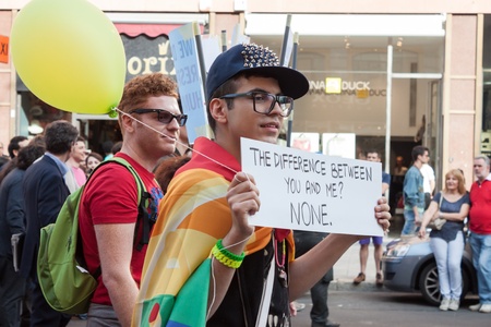 MILAN, ITALY - JUNE 29: Thousands of people march in the city streets for the annual gay pride parade, claiming equality and legal rights in Milan on JUNE 29, 2013のeditorial素材