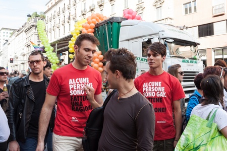 MILAN, ITALY - JUNE 29: Thousands of people march in the city streets for the annual gay pride parade, claiming equality and legal rights in Milan on JUNE 29, 2013のeditorial素材