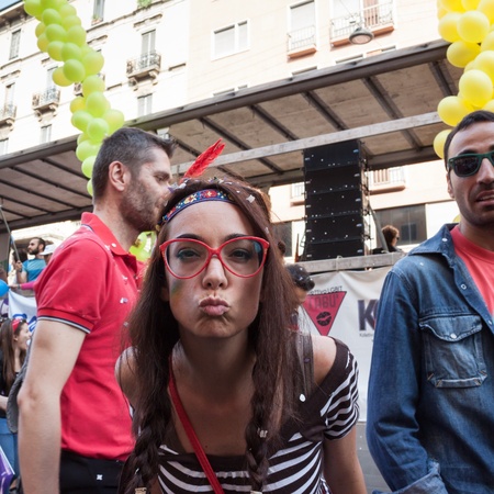 MILAN, ITALY - JUNE 29: Thousands of people march in the city streets for the annual gay pride parade, claiming equality and legal rights in Milan on JUNE 29, 2013のeditorial素材