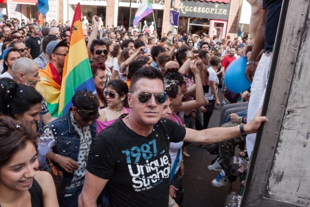 MILAN, ITALY - JUNE 29: Thousands of people march in the city streets for the annual gay pride parade, claiming equality and legal rights in Milan on JUNE 29, 2013のeditorial素材