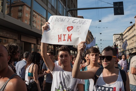 MILAN, ITALY - JUNE 29: Thousands of people march in the city streets for the annual gay pride parade, claiming equality and legal rights in Milan on JUNE 29, 2013のeditorial素材