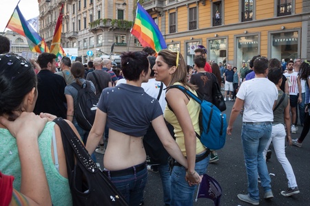 MILAN, ITALY - JUNE 29: Thousands of people march in the city streets for the annual gay pride parade, claiming equality and legal rights in Milan on JUNE 29, 2013のeditorial素材
