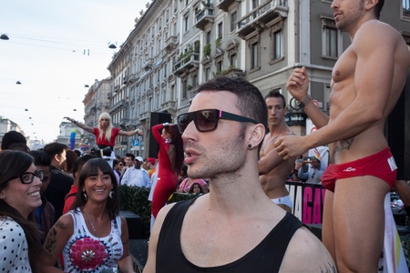 MILAN, ITALY - JUNE 29: Thousands of people march in the city streets for the annual gay pride parade, claiming equality and legal rights in Milan on JUNE 29, 2013のeditorial素材