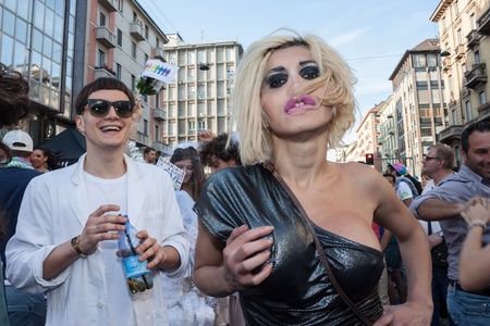 MILAN, ITALY - JUNE 29: Thousands of people march in the city streets for the annual gay pride parade, claiming equality and legal rights in Milan on JUNE 29, 2013のeditorial素材