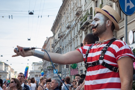 MILAN, ITALY - JUNE 29: Thousands of people march in the city streets for the annual gay pride parade, claiming equality and legal rights in Milan on JUNE 29, 2013のeditorial素材