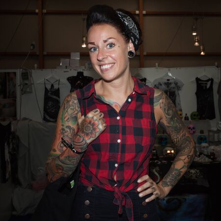 MILAN, ITALY - JUlY 6: People visit Tatuami, important event dedicated to the world of tattoos in Milan on JUlY 6, 2013のeditorial素材