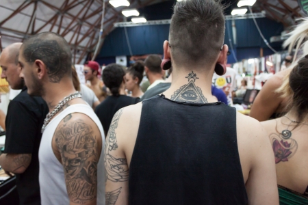 MILAN, ITALY - JUlY 6: People visit Tatuami, important event dedicated to the world of tattoos in Milan on JUlY 6, 2013のeditorial素材