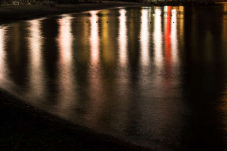 Sea water with reflections texture backgroundの写真素材