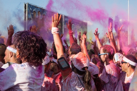 MILAN, ITALY - SEPTEMBER 7  Thousands of people take part in The Color Run event, the funniest and most colorful urban running ever where participants become targets for multicolor powders thrown by organization in Milan on September 7, 2013のeditorial素材