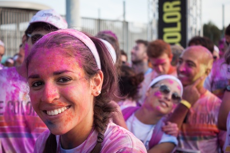 MILAN, ITALY - SEPTEMBER 7  Thousands of people take part in The Color Run event, the funniest and most colorful urban running ever where participants become targets for multicolor powders thrown by organization in Milan on September 7, 2013のeditorial素材