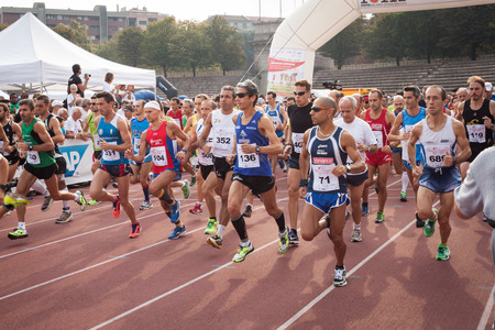 MILAN, ITALY - SEPTEMBER 22  Thousands of athletes take part in the Innovation Running, race and sporting event organized to promote blood donation in Milan on September 22, 2013 のeditorial素材