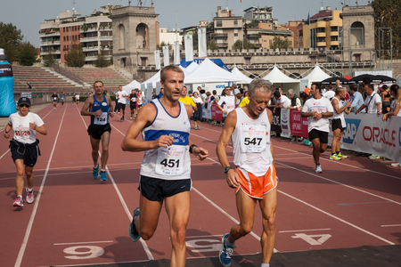 MILAN, ITALY - SEPTEMBER 22  Thousands of athletes take part in the Innovation Running, race and sporting event organized to promote blood donation in Milan on September 22, 2013 のeditorial素材