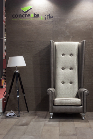 MILAN, ITALY - OCTOBER 3  Big armchair with lamp at Made expo, international architecture and building trade show on October 3, 2013 in Milan のeditorial素材