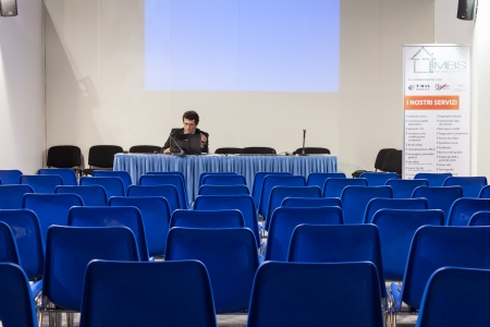 MILAN, ITALY - OCTOBER 3  Speaker in front of empty chairs at Made expo, international architecture and building trade show on October 3, 2013 in Milan のeditorial素材