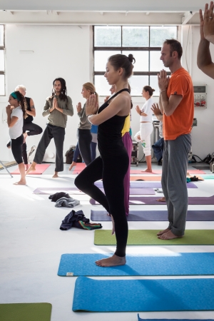 MILAN, ITALY - OCTOBER 11  People take a class at Yoga Festival 2013, event dedicated to yoga, meditation and healthy lifestyle on OCTOBER 11, 2013 in Milan のeditorial素材
