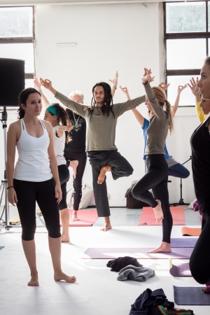 MILAN, ITALY - OCTOBER 11  People take a class at Yoga Festival 2013, event dedicated to yoga, meditation and healthy lifestyle on OCTOBER 11, 2013 in Milan のeditorial素材
