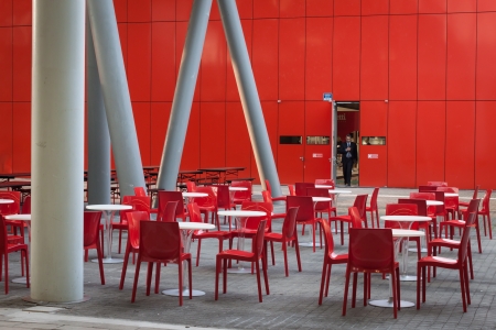 MILAN, ITALY - OCTOBER 18  Empty red chairs with tables at Host 2013, international exhibition of the hospitality industry on OCTOBER 18, 2013 in Milan  のeditorial素材